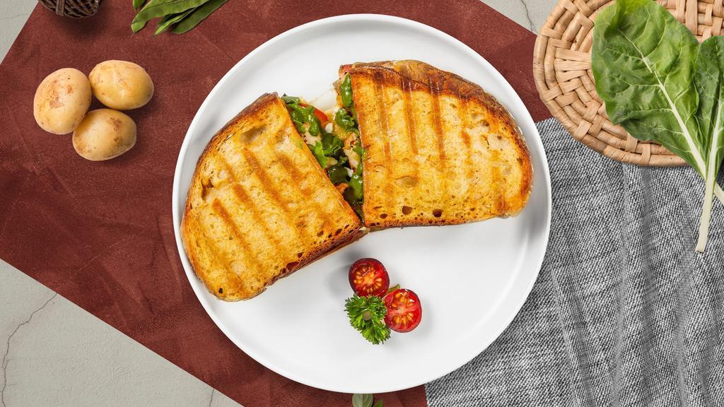 Join The Club Chicken Panini · Grilled chicken, lettuce, tomato, bacon, and muenster cheese on your choice of toasted bread.