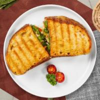 Wanna Parmigiana Chicken Panini · Grilled chicken, parmesan cheese, and marinara sauce on your choice of toasted bread.