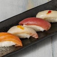 Sushi Appetizer · Four pieces of assorted fresh raw fish over rice.