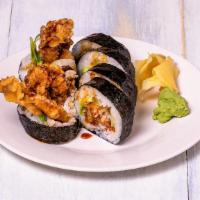 Spider Roll · Tempura-fried soft shell crab, avocado, cucumber and romaine lettuce. Jumbo roll with eel sa...