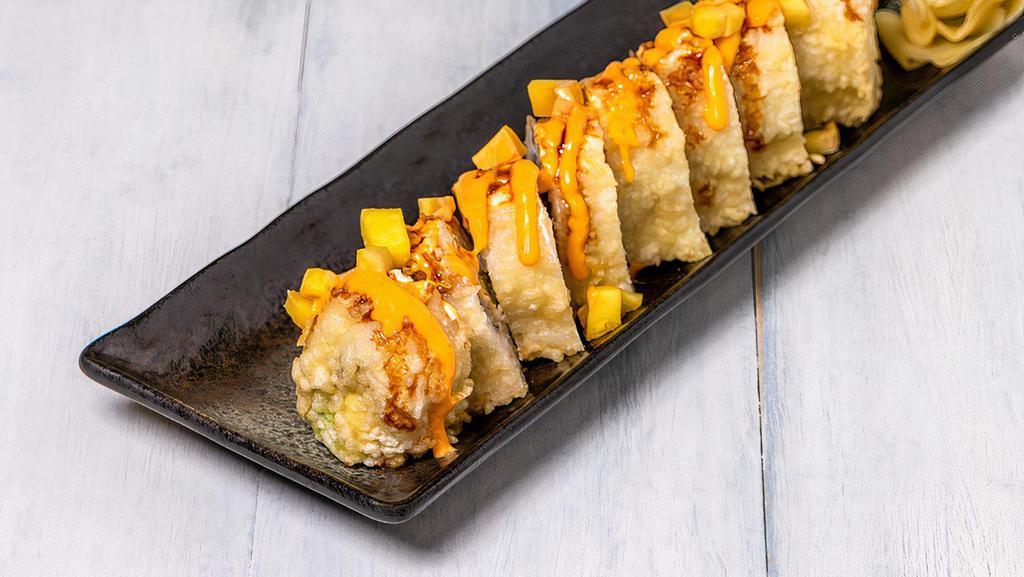 Crazy Friday Roll · Tempura-fried king crab and avocado topped with cream cheese and mango. Served with eel sauce and spicy mayo.