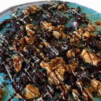 Cookie Monster Pie · Cookie Monster Pie: Cookies & Cream Cookie, Cookie Monster Ice Cream, Chopped Oreos and Choc...