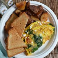 Avocado, Spinach, Tomato, Onion & Bacon Omelette · Comes with Homefries & Toast