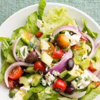 The Greek Salad · Organic grilled chicken with feta cheese, tomatoes, cucumbers, olives, and red onion served ...
