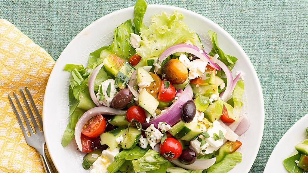 The Greek Salad · Organic grilled chicken with feta cheese, tomatoes, cucumbers, olives, and red onion served over romaine lettuce.