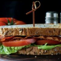 Vegan Blt · Vegan bacon with lettuce, tomato, and vegan mayo on Ezekiel bread.