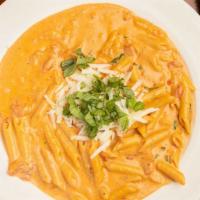 Penne Vodka · Penne pasta with plum tomato, garlic, basil and cream. Add chicken and shrimp for an additio...