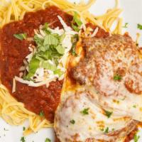 Chicken Parmesan · Two breaded cutlets with homemade sauce parmesan and side of linguine.
