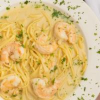 Shrimp Scampi · Shrimp sauteed with garlic in a lemon butter sauce tossed with linguine.
