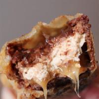 Fried Snickers (1) · Snickers bar battered deep fried and tossed in powdered sugar