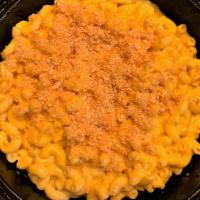 Classic Mac · Blend of American and cheddar topped with panko crumbs.