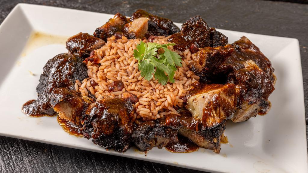 Jerk Pork · Pork marinated in herbs and zesty jerk sauce and grilled to succulent perfection.