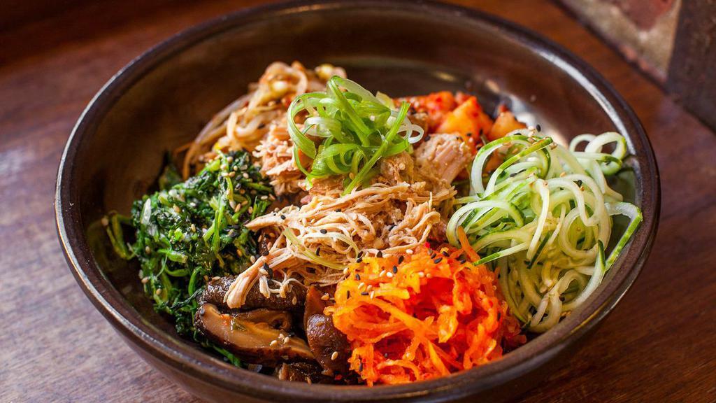 Bibimbap · Made with either rice or noodles featuring pickled daikon, cucumber, kimchi, shiitake mushrooms, beansprouts, spinach, and protein of choice. Served with a housemade gochujang sauce. 

Can be vegan (tofu), or gluten-free (chicken and rice).

Recommended topping: fried egg.