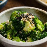 Garlic Broccoli With Tofu · Blanched broccoli mixed with crumbled tofu and garlic sesame dressing. VEGAN!