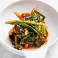 Chives Kimchi 부추김치 · A kimchi made with chives mixed with fish sauce, red chili pepper powder, crushed garlic and...