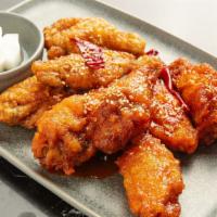 Chicken Wings · Famous Korean chicken wings with choice of soy sauce or sweet and spicy sauce.