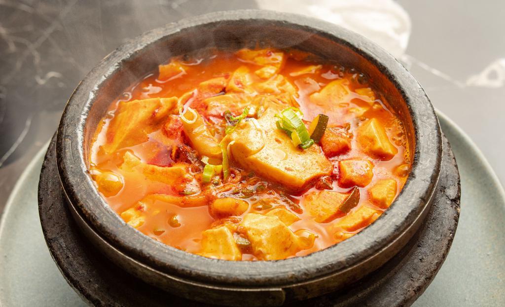 Soondubu Stew · Silken tofu and vegetable soup and choice of toppings.