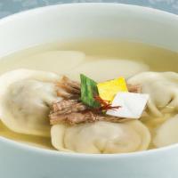 Manduguk · Dumpling soup. Dumplings, vegetables and egg in beef broth.