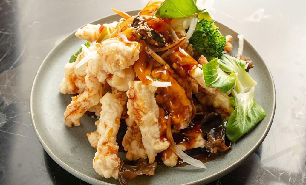 Tang Soo Yook · Crispy deep-fried pork vegetables.