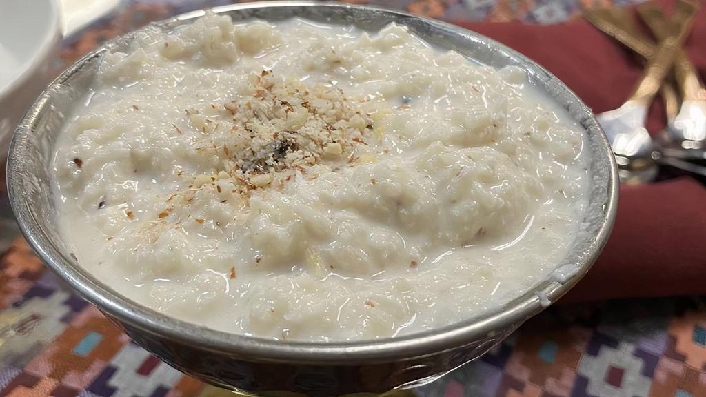 Rice Pudding · Traditionally cooked rice with milk and nuts.