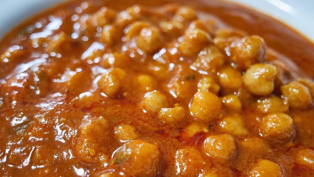 Chana Masala · Chick peas cooked in onion and tomato sauce.