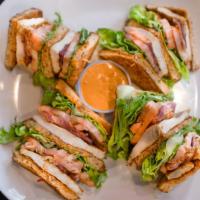 Grilled Chicken Club · With smoked bacon, lettuce, tomato, roll bread plus chipotle mayo.