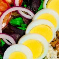 Cobb Salad · Mixed greens, bacon, avocado, blue cheese, red onions, tomatoes, hard boiled eggs, blue chee...