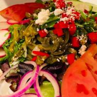 Mexican Cactus Salad · mixed greens, citrus cactus salad with (tomato, red onion, serrano peppers,cilantro), avocad...