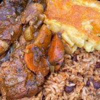 Brown Stew Chicken Specialty Meal · 32oz Chicken meal stewed in a brown sauce with potatoes, red peppers,  green peppers and oni...