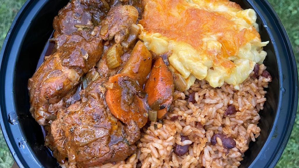 Brown Stew Chicken Specialty Meal · 32oz Chicken meal stewed in a brown sauce with potatoes, red peppers,  green peppers and onions. That includes two sides, two sweet plantains.