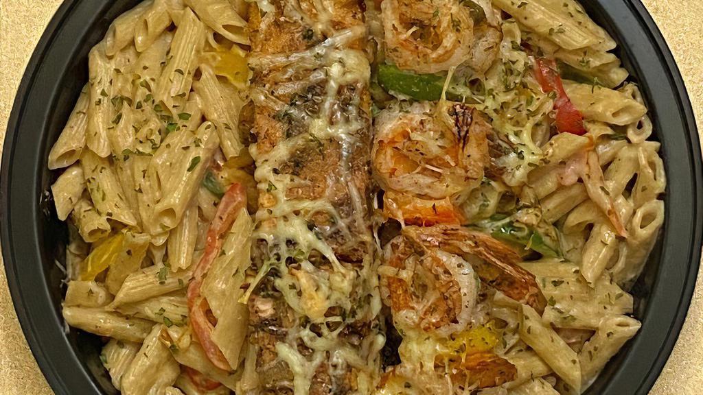 Salmon & Shrimp Casa Pasta · Salmon and shrimp marinated and chargrilled in jerk seasonings in a creamy alfredo sauce with penne pasta, red, yellow and green peppers.