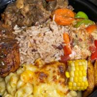 Oxtail, Jerk Chicken & Salmon Sampler Platter · Oxtails marinated and cooked in a brown stew, Chicken marinated and grilled in jerk seasonin...