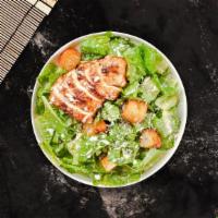 Chicken Caesar Cellar Salad · Romaine lettuce, grilled chicken, house croutons, and parmesan cheese tossed with caesar dre...