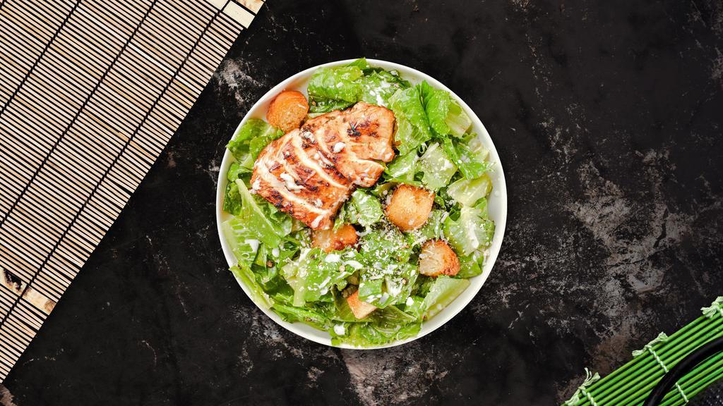 Chicken Caesar Cellar Salad · Romaine lettuce, grilled chicken, house croutons, and parmesan cheese tossed with caesar dressing.