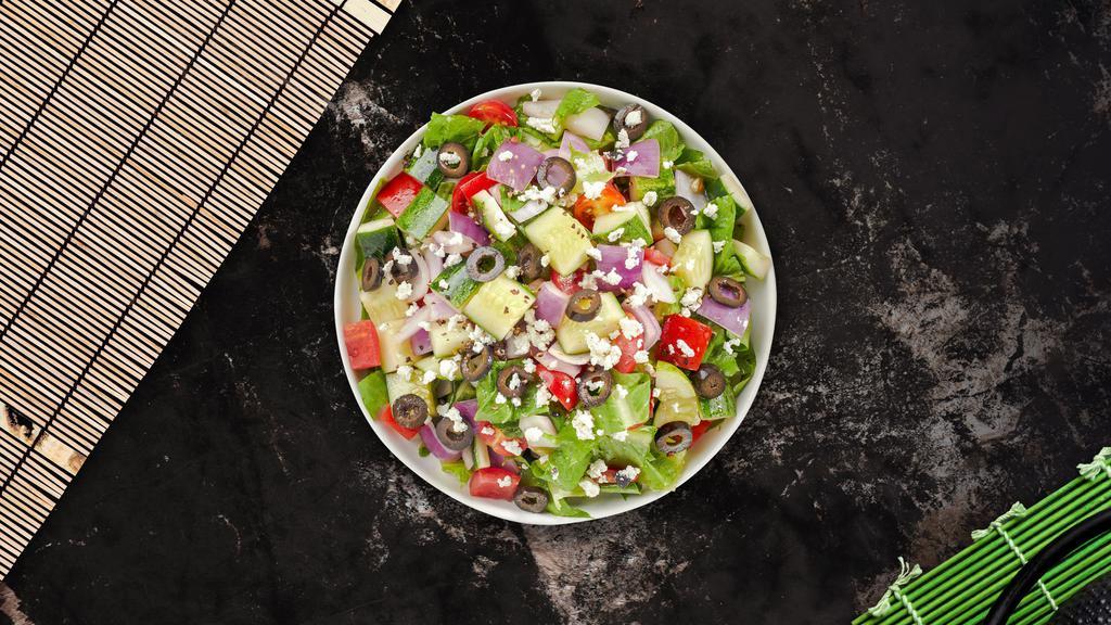Feast Greek Salad · (Vegetarian) Romaine lettuce, cucumbers, tomatoes, red onions, olives, and feta cheese tossed with balsamic vinaigrette dressing.