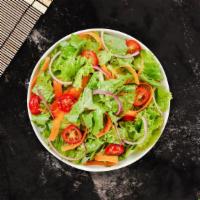 Classic House Salad · (Vegetarian) Romaine lettuce, cucumbers, cherry tomatoes, carrots, fresh bell peppers, and o...