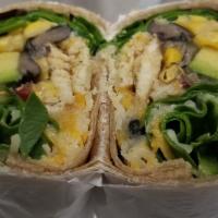 Grilled Chicken Avocado Wrap · Grilled chicken breast, spinach, avocados, corn, black bean, shredded cheddar cheese, lime.