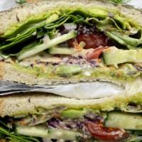 Ultimate Vegan Sandwich · Vegan. Multi grain bread, avocado pesto, carrot, cucumber, red cabbage, red onion, mixed gre...