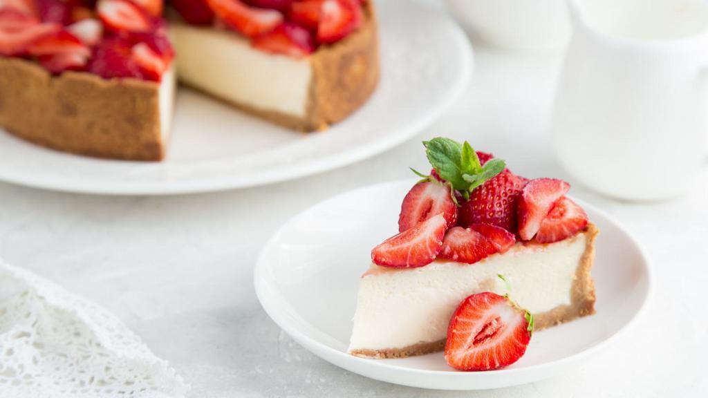 Strawberry Cheesecake · Creamy dream cheesecake with strawberry sauce.