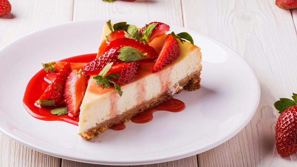 Strawberry Cheesecake · Creamy dream cheesecake with strawberry sauce.
