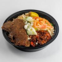 Gyro Bowl · Top quality beef & lamb. Made with authentic Greek spices.