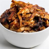Shawarma · Fire-roasted marinated chicken thighs.