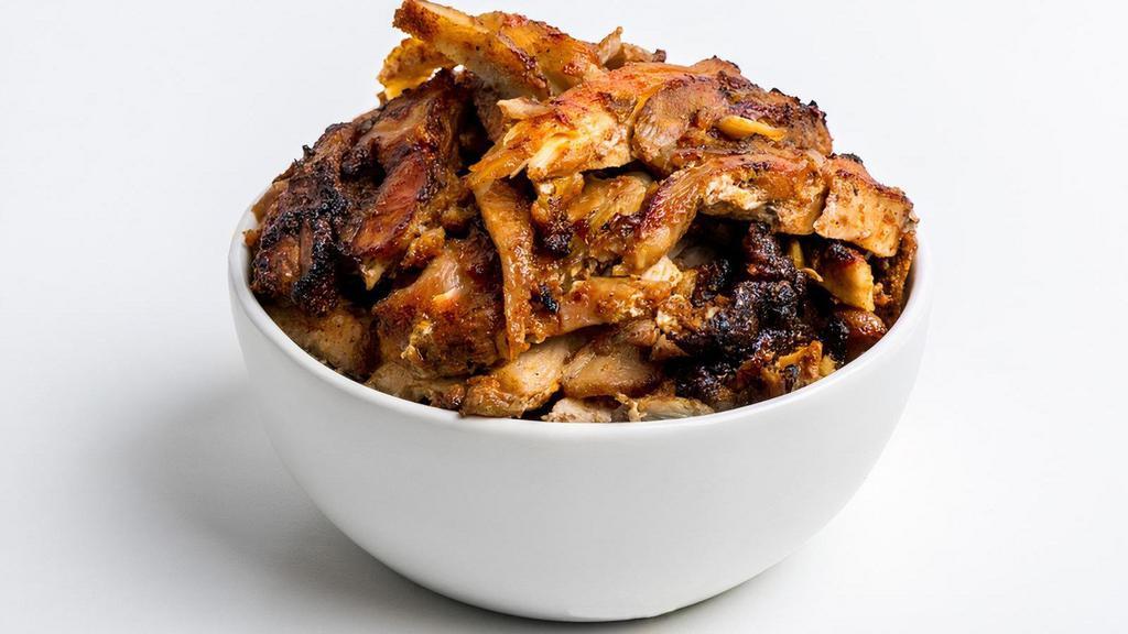 Shawarma · Fire-roasted marinated chicken thighs.