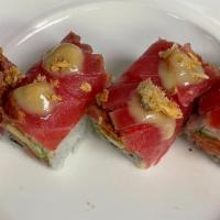 Volcano Roll · Spicy tuna crunch and avocado inside pepper tuna on top crispy shallot spicy miso glaze.