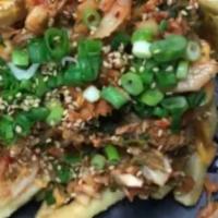 Kimchi Fries · Shoestring fries with kimchi gochujang aioli.