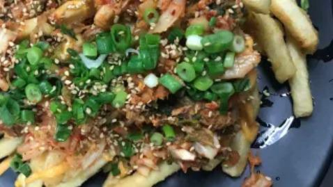 Kimchi Fries · Shoestring fries with kimchi gochujang aioli.