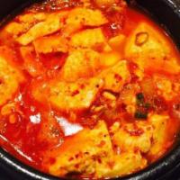 Seafood Tofu Stew · Hot. Spicy soft tofu stew with vegetables, seafood and egg. Served with rice and kimchi.