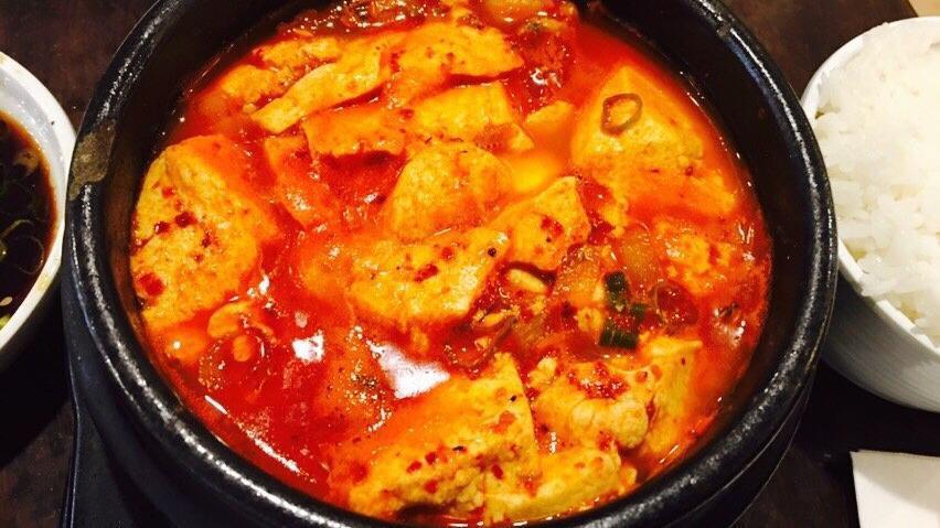 Seafood Tofu Stew · Hot. Spicy soft tofu stew with vegetables, seafood and egg. Served with rice and kimchi.