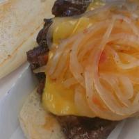 Charbroiled Rib Eye Steak · On a hoagie roll with sautéed onions.