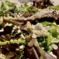 Mesclun Salad With Citrus Vinaigrette · Served with crumbled gorgonzola cheese & tomatoes and tossed with a citrus vinaigrette dress...